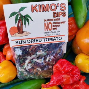 Kimo's Dips Sun Dried Tomato mix in bed of mixed peppers