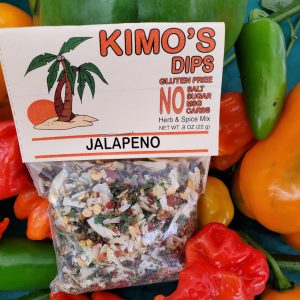 Kimo's Dips Jalapeño SSpice Mix in bed of mixed peppers