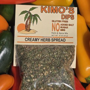 Package of Kimo's Creamy Herb Spread in a flat lay presentation